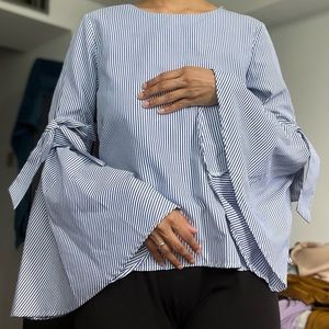 Blue and white bell sleeve blouse